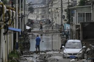 Hujan Deras dan Banjir Landa Beijing, China, 33 Orang Tewas, 18 Hilang