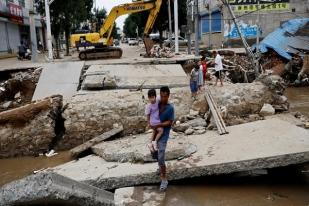 China Peringatkan Hujan Lebat Berpotensi Banjir dan Tanah Longsor