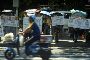 China Pangkas Suku Bunga, Luncurkan Upaya Lain Atasi Ekonomi Yang Melambat