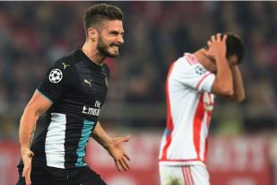 Tiga Gol Giroud Loloskan Arsenal Fase Dua  Liga Champions