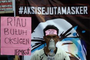 Puluhan Jurnalis Lintas Media Gelar Aksi Peduli Asap untuk Sumatera dan Kalimantan