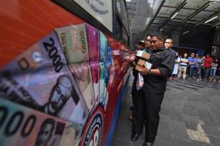 Rupiah Melemah Menjadi Rp 13.060