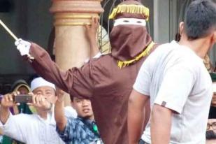 Qanun Jinayat di Aceh Melanggar Hak Asasi Manusia