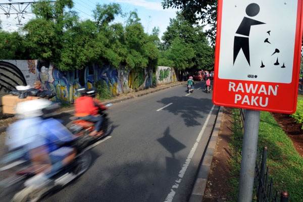 Ranjau Paku Sengsarakan Pengguna Jalan